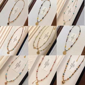 Bohemian beaded necklace set with vintage tiger eye stone and multi-style metal pendants