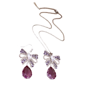 Elegant bow jewelry set with purple zircon pendant necklace and matching earrings