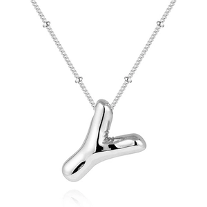 Detailed view of silver bubble letter Y pendant necklace with sleek bead chain on white base