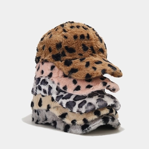 Stack of colorful leopard print faux fur baseball caps for women winter warmth