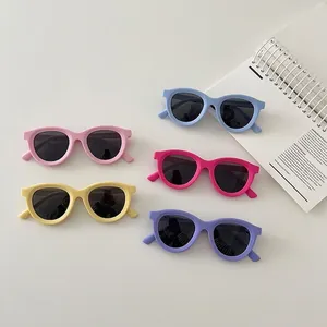 Kids round matte polarized sunglasses in candy colors with black UV protection lenses