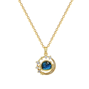 Collana in acciaio al titanio con ciondolo pianeta blu e anello celeste dorato lucido