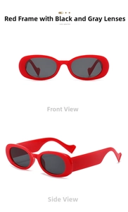 Detail view of red oval sunglasses with grey lenses and unique heart temple tips