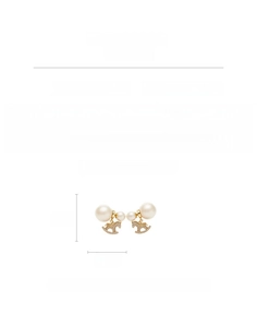Detailed view of rocking horse earring with cotton pearl and pave zircon stones