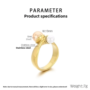 Detail showing two-tone shell pearls on a gold stainless steel ring band