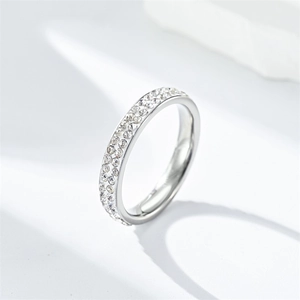 Detailed macro view of elegant silver titanium steel ring with double row crystal settings