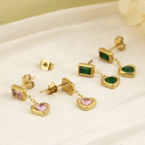 Elegant 18K gold plated heart and square zircon drop earrings on white silk fabric