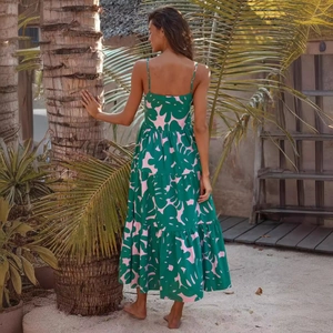 Women's tropical leaf print backless maxi dress with spaghetti straps and tiered skirt