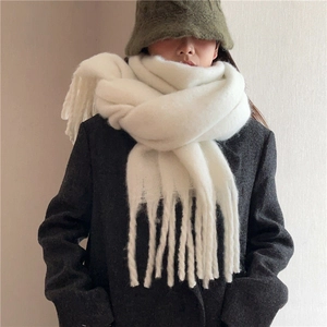 White mohair scarf for women with thick plush texture and fringe tassels for winter warmth