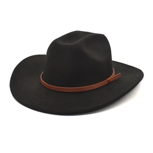 Detail of a black felt fedora crown with a brown braided leather band and buckle accent