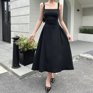 Elegant black A-line midi dress featuring square neck and gathered waist detail