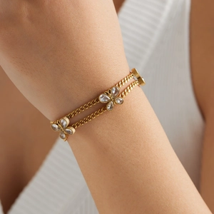 Double-layered gold-plated stainless steel butterfly bracelet with sparkling zircon stones