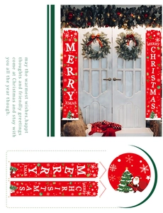 Detail of red Merry Christmas porch banners with white lettering and holiday patterns