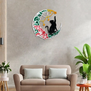 Detailed view of moon and cat silicone mold wall hanging with floral resin art textures