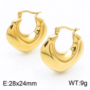 Macro detail of polished gold U-shaped hollow hoop earrings sized 28x24mm weighing 9g