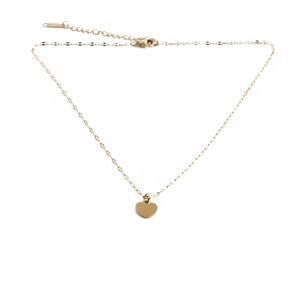Elegant gold titanium heart pendant necklace with fine chain and lobster clasp on white