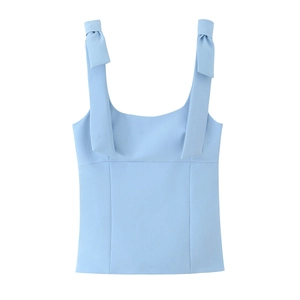 Light blue bow strap tank top with square neckline shown in a flat lay minimalist style