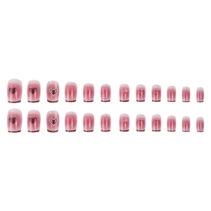 Pink gradient press-on nails with pearl hearts and French blush style design
