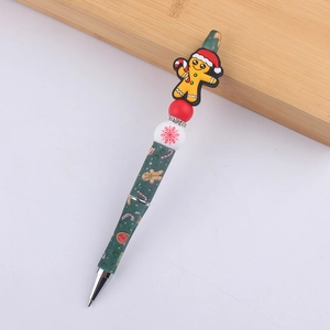Detail of gingerbread man silicone bead pen with Christmas snowflake patterns