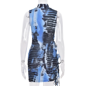 Detail view of blue and black tie-dye sleeveless high-neck mini dress back seams