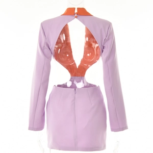 Detail showing the purple backless dress with orange collar and cut-out design