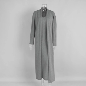 Detail view of the grey knitted long sleeve cardigan and matching slim fit maxi dress