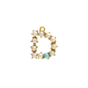 Macro detail of golden letter D pendant with white pearls and turquoise bead inlay