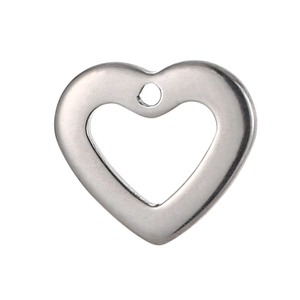 Macro shot of silver hollow heart-shaped stainless steel charms for DIY jewelry making