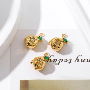 Detail of 18K gold plated lemon charms with green gems and clear zircon for DIY jewelry