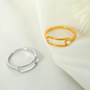 Irregular multi-layer minimalist rings with white pearls in gold and silver finish