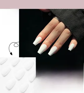 Macro detail of matte white solid color long coffin press-on nails for manicures