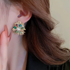 French vintage sunflower earrings with pearls and colorful crystals on model