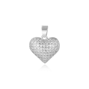 Macro shot of silver heart pendant featuring shimmering pave-set cubic zirconia stones
