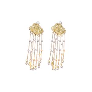 Golden flower cloud earrings with pearl tassels and crystal accents on white background