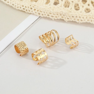 Set of 4 gold minimalist ear cuffs with star cutout and spiral textured designs