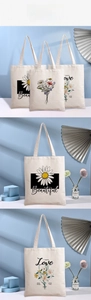 Detailed views of creative daisy and floral prints on high-quality off-white canvas tote bags