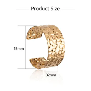 Minimalist wide hammered metal cuff bracelet with product size 63mm by 32mm