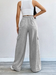 Women's wide leg grey cotton blend trousers with side pockets and elastic waist design