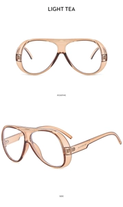 Detail view of light tea oversized outdoor sunglasses with streamlined frame and side profile