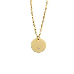 Close-up of minimalist gold circular pendant with a precision-set small white gemstone