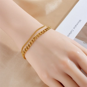 Elegant gold double-layer titanium bracelet with Cuban and thin circular links on silk
