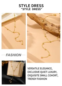 Detailed views of a gold-plated Y-shaped chain necklace with cubic zirconia accents