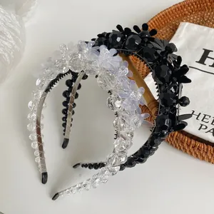 Elegant beaded flower headbands in black and clear crystals with non-slip teeth grip