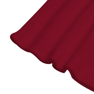 Detailed macro view of red waffle knit fabric texture and ribbed stitching on polo shirt