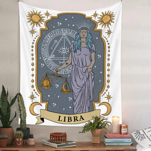 Detailed view of Libra zodiac tapestry featuring celestial sun and moon illustrations
