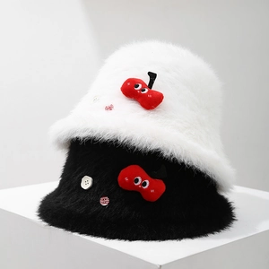 Winter plush bucket hat with cartoon cherry and button detail in black and white colors