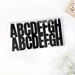 Close-up of black 2.5 inch alphabet stickers for classroom and mailbox decoration