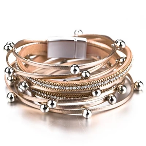 Detail of multilayer PU leather bracelet with rose gold beads and magnetic clasp