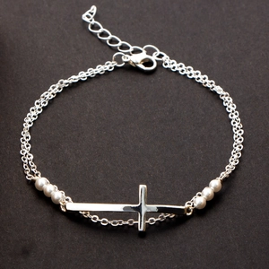 Silver multi-layer cross bracelet with freshwater pearls and adjustable lobster clasp