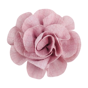 Macro shot of 7cm pink bubble crepe handmade fabric flower with detailed textured petals